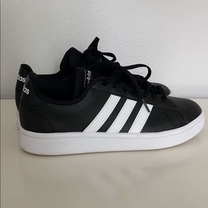 Black leather adidas shoes